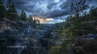 Dramatic Canyon Landscape at Sunset with Stormy Skies