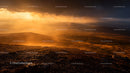 Dramatic Sunset Over Majestic Mountain Landscape