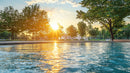 Golden Sun Setting Over Tranquil Urban Park Landscape