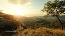 Breathtaking Sunset over Rolling Hills and Silhouetted Tree