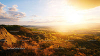 Breathtaking Sunset Over Rolling Hills in Countryside