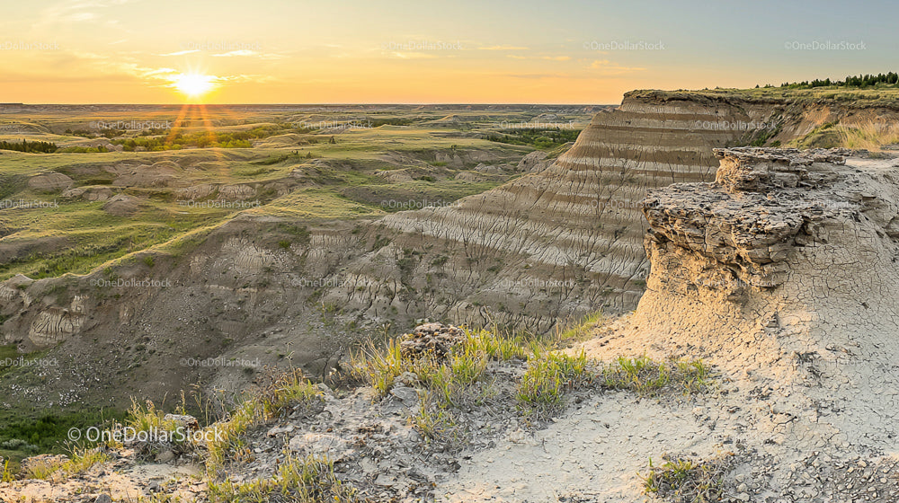 Majestic Canyon Landscape at Sunset with Eroded Cliffs