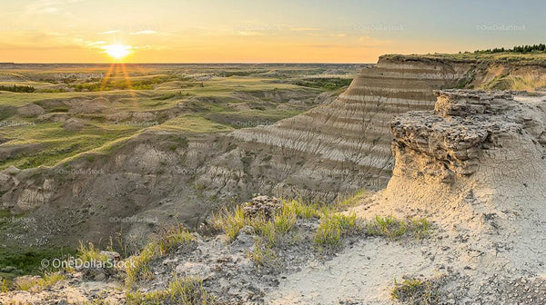 Majestic Canyon Landscape at Sunset with Eroded Cliffs