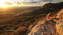 Rocky Landscape at Sunset with Forested Valley Panorama