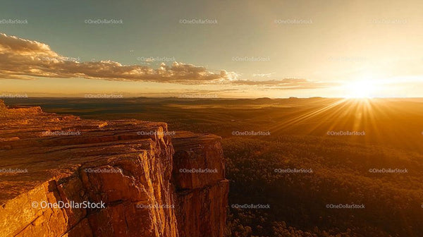 Majestic Sunset Over Sandstone Cliffs in Remote Wilderness