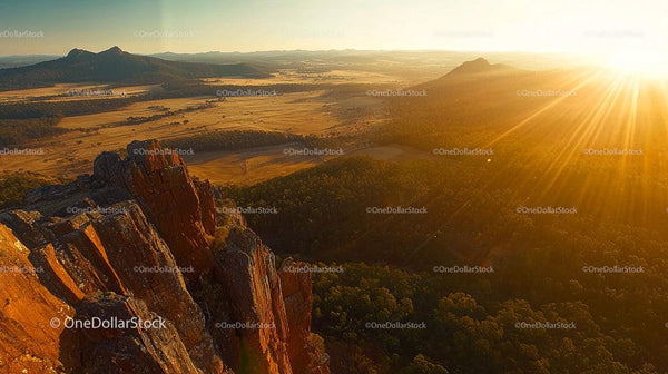 Golden Sunset Over Rugged Mountain Landscape