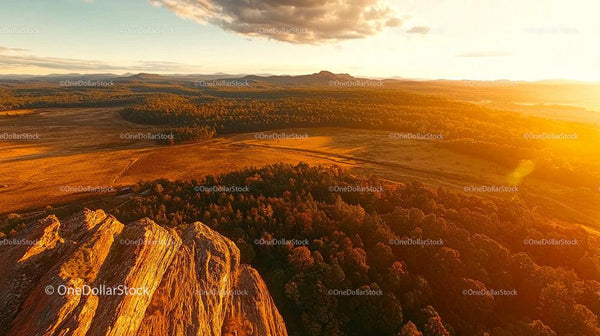 Sunset Over Rocky Cliffs and Forested Plains