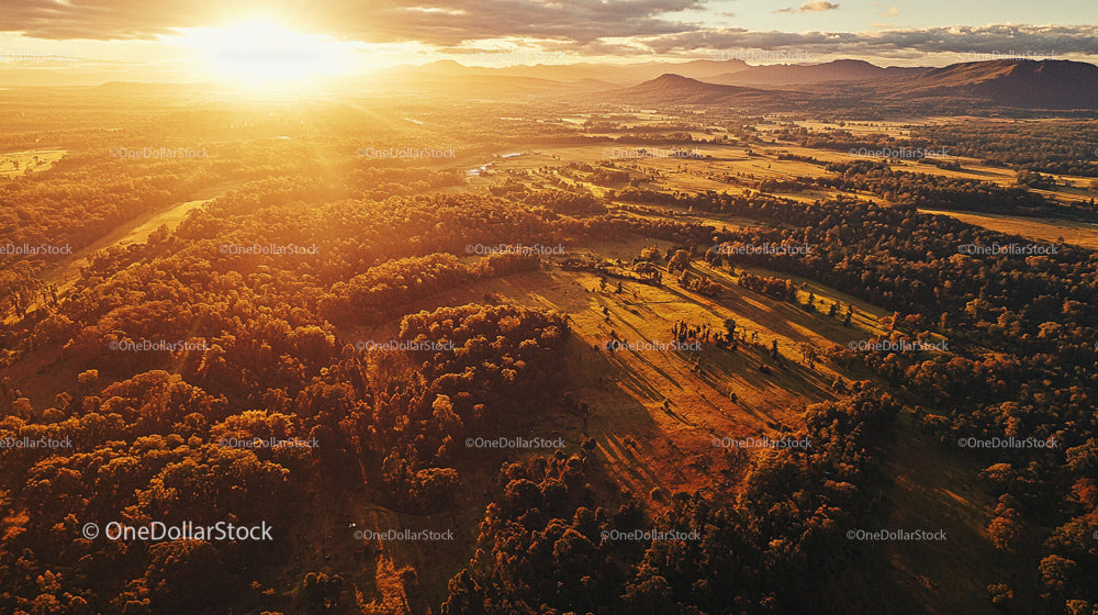Golden Sunset Over Scenic Valley and Rolling Hills