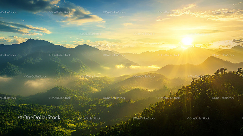 Sunrise Over Misty Mountain Landscape with Lush Green Valleys