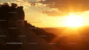 Majestic Canyon Sunset with Warm Golden Hues