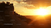 Majestic Canyon Sunset with Warm Golden Hues