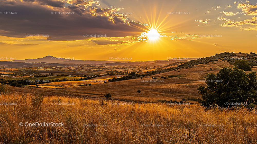 Golden Sunset Over Tranquil Rolling Hills Landscape