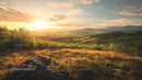 Golden Hour Sunlight Over Mountainous Landscape