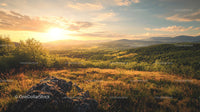 Golden Hour Sunlight Over Mountainous Landscape