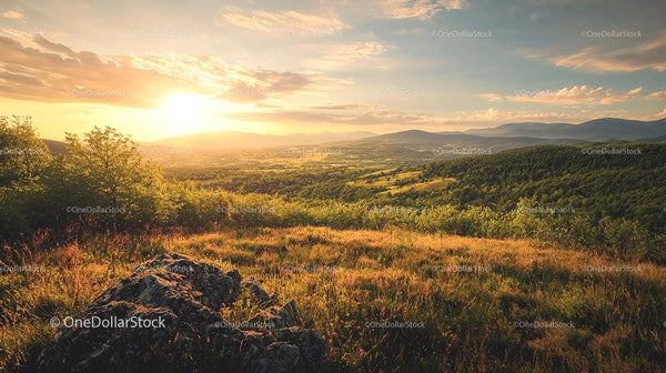 Golden Hour Sunlight Over Mountainous Landscape