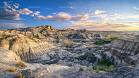 Stunning Badlands Landscape with Dramatic Sunset Sky