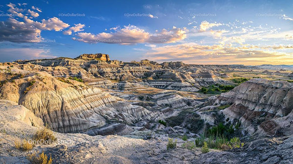 Stunning Badlands Landscape with Dramatic Sunset Sky