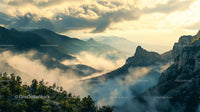 Misty Sunrise Over Rugged Mountain Landscape