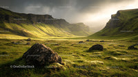 Sunlit Mountain Valley with Lush Greenery and Rocky Terrain
