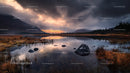 Dramatic Sunset Over Tranquil Mountain Lake