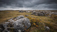 Stormy Sky Over Rugged Rocky Landscape