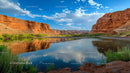 Scenic River through Red Rock Canyon under Blue Sky