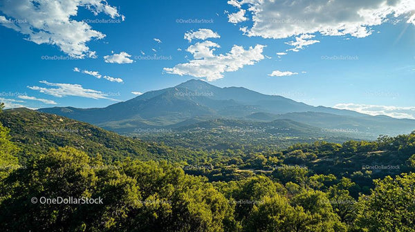 Majestic Mountain Landscape with Lush Greenery and Blue Skies