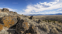 Dramatic Desert Landscape with Rocky Terrain and Open Sky