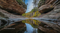Serene Canyon with Autumn Reflections and Rock Formations