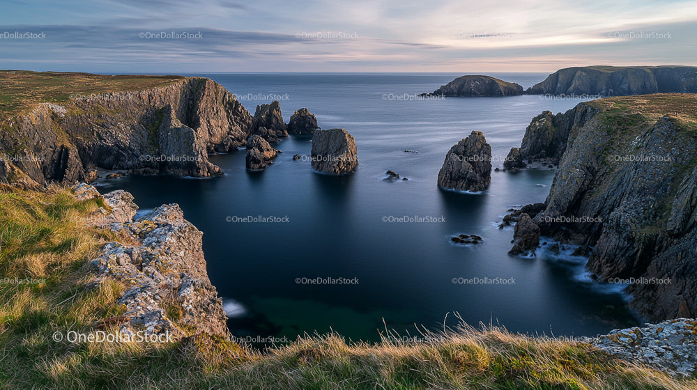 Dramatic Coastal Cliffs and Serene Ocean View