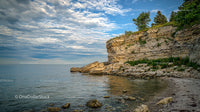 Rocky Cliffs Overlooking a Peaceful Ocean Scene