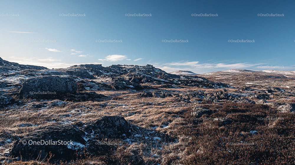Rugged Highland Landscape Under Clear Blue Sky