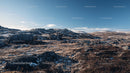 Rugged Highland Landscape Under Clear Blue Sky
