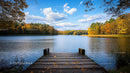 Autumn Lake View with Wooden Pier and Forest Reflections