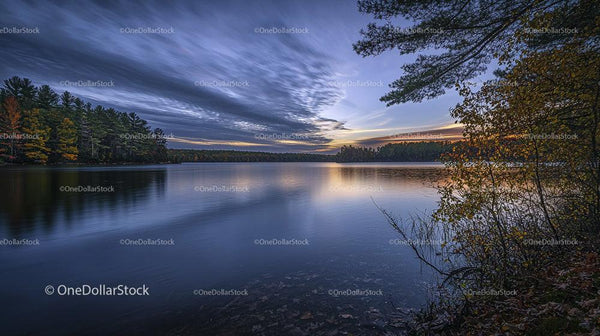 Tranquil Lake and Autumn Forest at Sunset