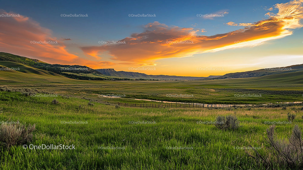 Scenic Countryside Sunset Over Green Rolling Hills