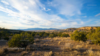 Expansive Desert Landscape Under Vibrant Blue Sky