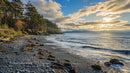 Scenic Rocky Coastline at Sunset with Dramatic Clouds