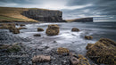 Dramatic Coastal Scenery with Basalt Cliffs and Rough Sea