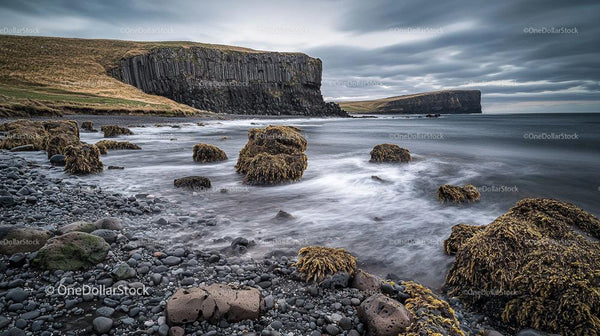 Dramatic Coastal Scenery with Basalt Cliffs and Rough Sea