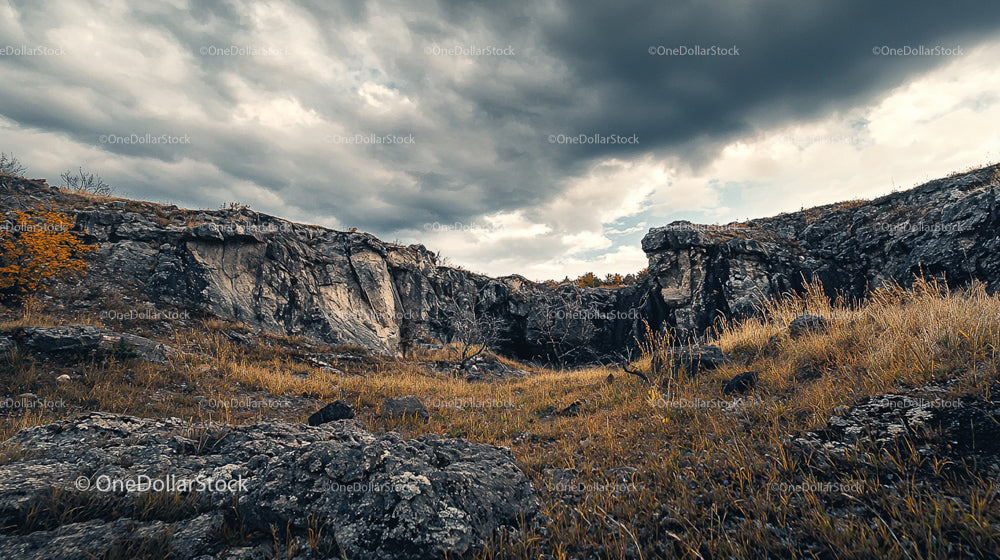 Dramatic Rocky Landscape Under Stormy Skies