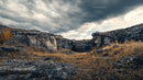 Dramatic Rocky Landscape Under Stormy Skies