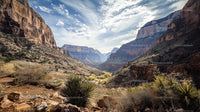 Majestic Grand Canyon with Rugged Cliffs and Dramatic Sky