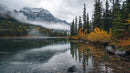 Misty Mountain Lake with Autumn Colored Trees and Reflection