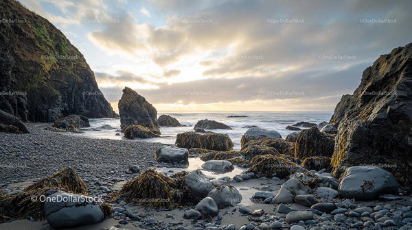 Sunset Over Rugged Rocky Coastline with Serene Ocean View