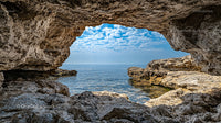 Scenic View of Ocean from Rocky Coastal Cave