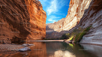 Majestic Canyon with Reflective River under Blue Sky