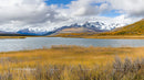 Majestic Snow-Capped Mountains with Serene Lake in Autumn