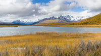 Majestic Snow-Capped Mountains with Serene Lake in Autumn