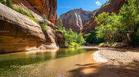 Serene Canyon with River and Red Rock Cliffs on Sunny Day